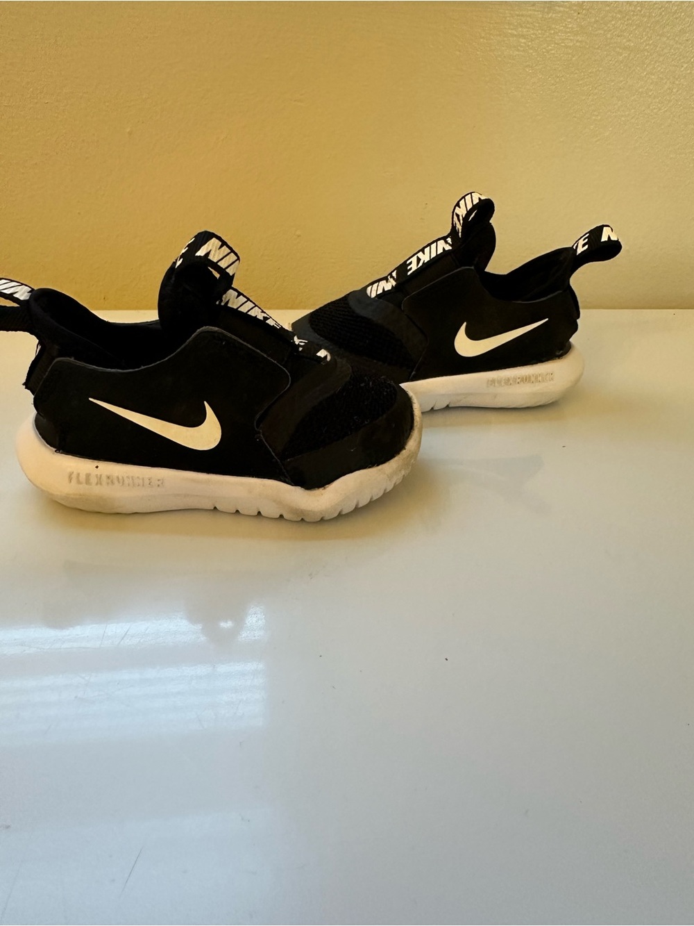 Nike Kids Black & White Slip-On Athletic Sneakers
